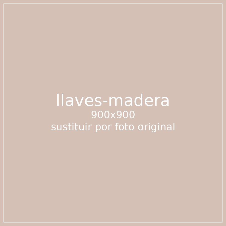 Llavero de una vivienda sobre una mesa de madera